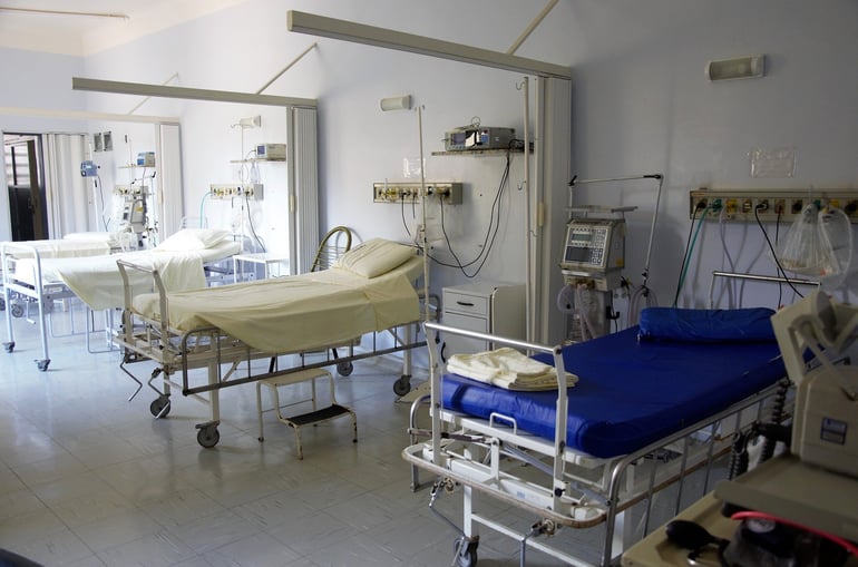 2 empty hospital beds