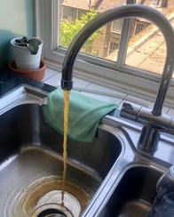 legionella tap running water in a kitchen sink
