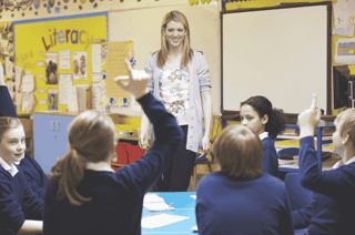 Legionella risk in schools - teacher at front of class