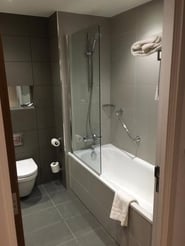 modern grey hotel bathroom